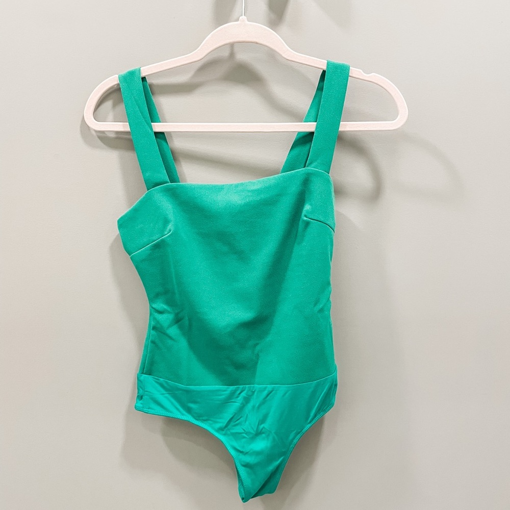 Never been worn before green bodysuit